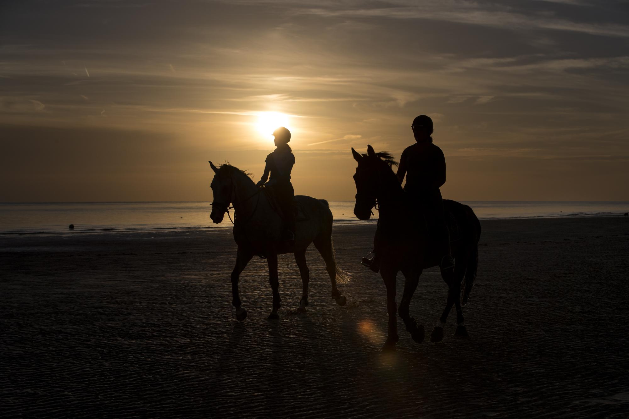 Riding on the Beach